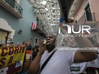 Teacher, Students and Workers of the UPR (University of Puerto Rico) protest against a budget cut of $94 million imposed by the Fiscal Contr...