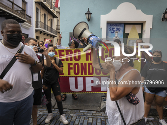 Teacher, Students and Workers of the UPR (University of Puerto Rico) protest against a budget cut of $94 million imposed by the Fiscal Contr...