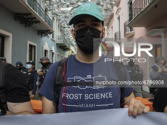 Teacher, Students and Workers of the UPR (University of Puerto Rico) protest against a budget cut of $94 million imposed by the Fiscal Contr...