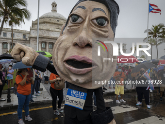 Teacher, Students and Workers of the UPR (University of Puerto Rico) protest against a budget cut of $94 million imposed by the Fiscal Contr...