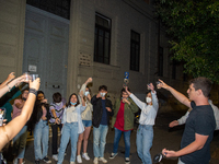 Fifth-grade students of Rieti sing Antonello Venditti's 'Notte Prima degli Esami' in front of their school, in Rieti, Italy, on June 15, 202...