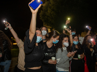 Fifth-grade students of Rieti sing Antonello Venditti's 'Notte Prima degli Esami' in front of their school, in Rieti, Italy, on June 15, 202...