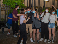 Fifth-grade students of Rieti sing Antonello Venditti's 'Notte Prima degli Esami' in front of their school, in Rieti, Italy, on June 15, 202...