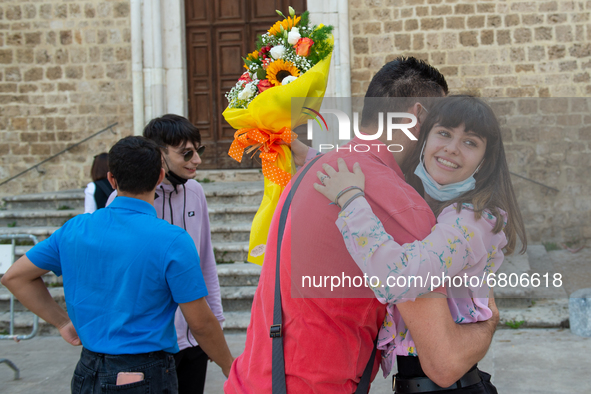 A fifth-year student embraces her father as soon as she has finished her high-school leaving examination in Rieti, Italy, on June 16, 2021....