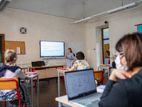 
A student speaks during a high-school exam inside the Liceo Classico Massimo D'Azeglio in Turin, Italy. High-school graduation exams commen...