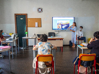 
A student speaks during a high-school exam inside the Liceo Classico Massimo D'Azeglio in Turin, Italy. High-school graduation exams commen...