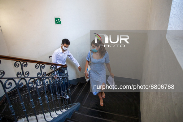 
A student climbs the stairs to go to the classroom for her  high-school exam inside the Liceo Classico Massimo D'Azeglio in Turin, Italy. H...