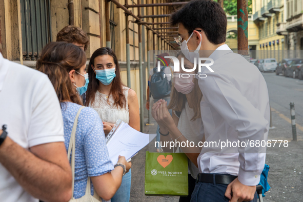 
Students review their exam subjects while waiting for their turn outside  the Liceo Classico Massimo D'Azeglio in Turin, Italy. High-school...