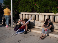  A couple during a demonstration in Athens, Greece, on June 16, 2021. Thousands of Athenians gathered outside the parliament to protest agai...