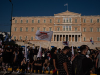  Thousands of protesters outside the Greek parliament.  (