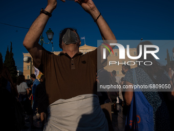  A pensioner taking a selfie during a demonstration in Athens, Greece, on June 16, 2021. Thousands of Athenians gathered outside the parliam...