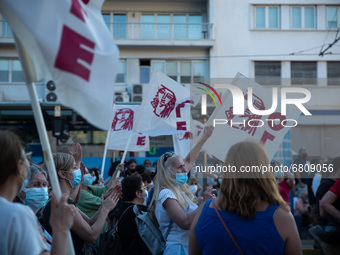  A woman raising her fist during a protest in Athens, Greece, on June 16, 2021. Thousands of Athenians gathered outside the parliament to pr...