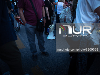  Protesters shouting slogans using a loudspeaker.  (