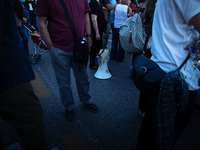  Protesters shouting slogans using a loudspeaker.  (