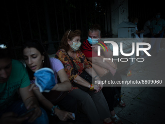  Pensioners sitting at a bench during a protest in Athens, Greece, on June 16, 2021. Thousands of Athenians gathered outside the parliament...