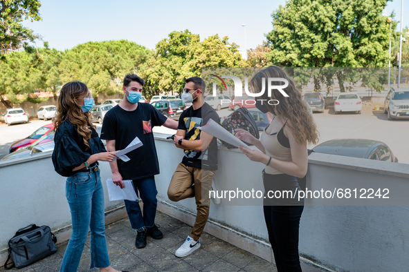 Students who review the project to be presented to the external commission before the state exam in Molfetta, Italy at the Mons.Antonio Bell...