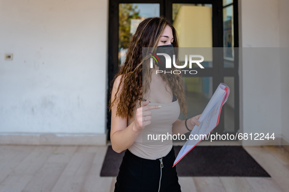 A student who reviews the project to be presented to the external commission before the state exam in Molfetta, Italy at the Mons.Antonio Be...