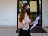 A student who reviews the project to be presented to the external commission before the state exam in Molfetta, Italy at the Mons.Antonio Be...