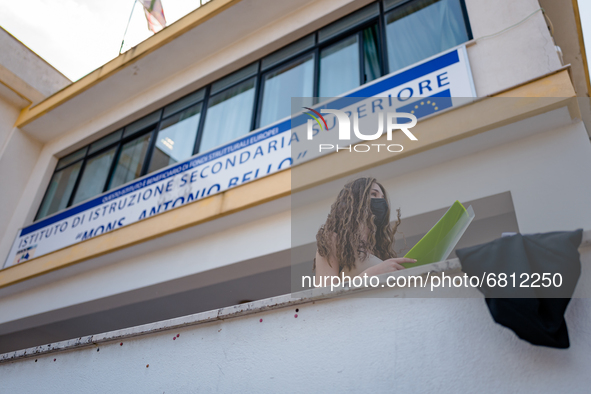 A student who reviews the project to be presented to the external commission before the state exam in Molfetta, Italy at the Mons.Antonio Be...