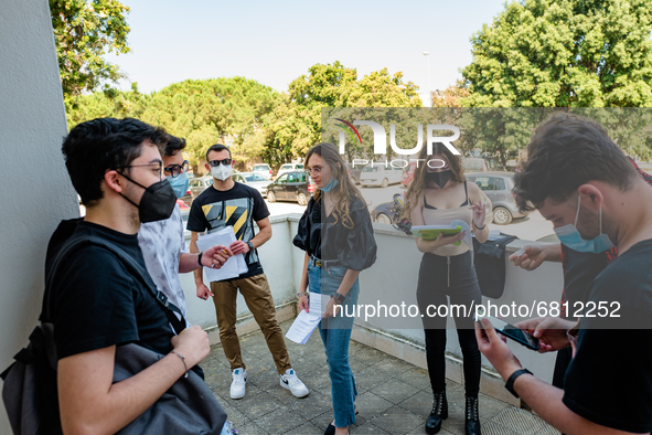 Students who review the project to be presented to the external commission before the state exam in Molfetta, Italy at the Mons.Antonio Bell...