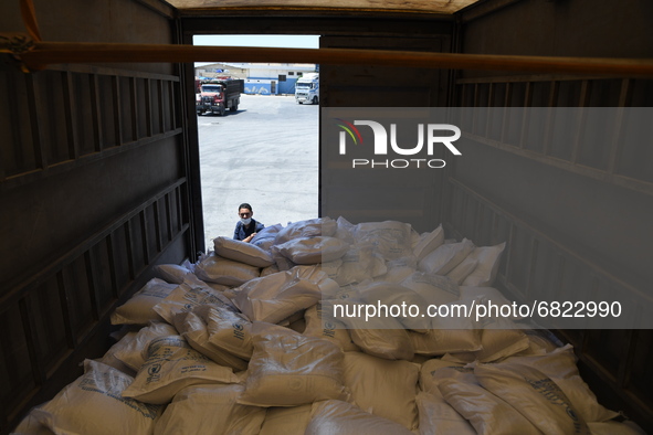 Trucks Loaded With Humanitarian Aid Provided By The United Nations World Food Program Enter Northern Syria Through Bab Al-Hawa Crossing on J...