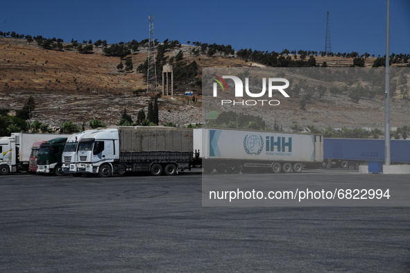 Trucks Loaded With Humanitarian Aid Provided By The United Nations World Food Program Enter Northern Syria Through Bab Al-Hawa Crossing on J...