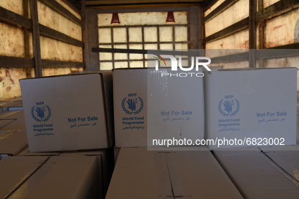 Trucks Loaded With Humanitarian Aid Provided By The United Nations World Food Program Enter Northern Syria Through Bab Al-Hawa Crossing on J...