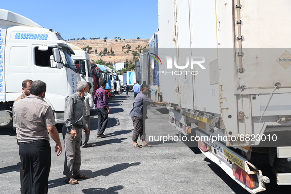 Trucks Loaded With Humanitarian Aid Provided By The United Nations World Food Program Enter Northern Syria Through Bab Al-Hawa Crossing on J...