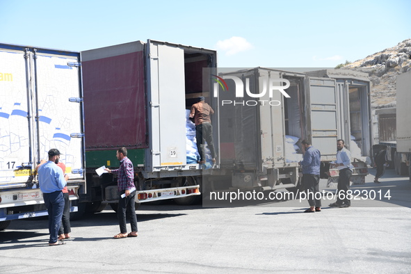 Trucks Loaded With Humanitarian Aid Provided By The United Nations World Food Program Enter Northern Syria Through Bab Al-Hawa Crossing on J...