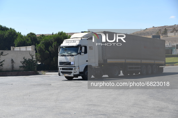 Trucks Loaded With Humanitarian Aid Provided By The United Nations World Food Program Enter Northern Syria Through Bab Al-Hawa Crossing on J...