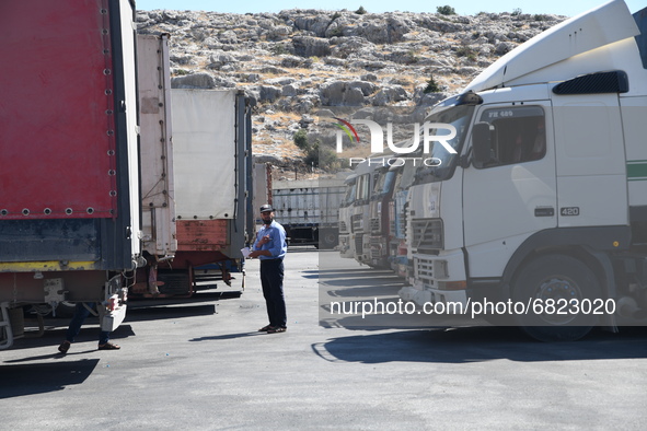 Trucks Loaded With Humanitarian Aid Provided By The United Nations World Food Program Enter Northern Syria Through Bab Al-Hawa Crossing on J...