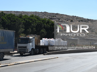 Trucks Loaded With Humanitarian Aid Provided By The United Nations World Food Program Enter Northern Syria Through Bab Al-Hawa Crossing on J...