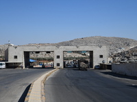 Trucks Loaded With Humanitarian Aid Provided By The United Nations World Food Program Enter Northern Syria Through Bab Al-Hawa Crossing on J...