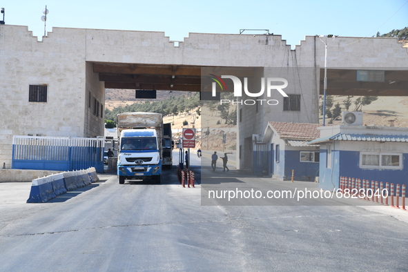 Trucks Loaded With Humanitarian Aid Provided By The United Nations World Food Program Enter Northern Syria Through Bab Al-Hawa Crossing on J...