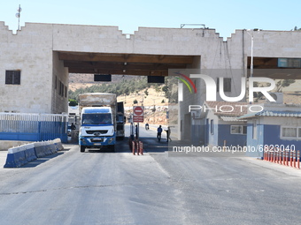 Trucks Loaded With Humanitarian Aid Provided By The United Nations World Food Program Enter Northern Syria Through Bab Al-Hawa Crossing on J...