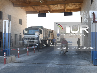 Trucks Loaded With Humanitarian Aid Provided By The United Nations World Food Program Enter Northern Syria Through Bab Al-Hawa Crossing on J...