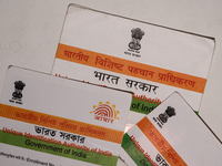 A photo taken in Tehatta, West Bengal, India on 01 July 2021 show the Aadhaar Cards issued by the Unique Identification Authority of India (...