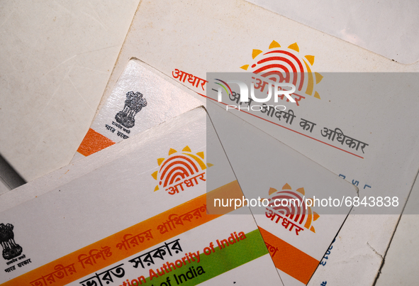 A photo taken in Tehatta, West Bengal, India on 01 July 2021 show the Aadhaar Cards issued by the Unique Identification Authority of India (...