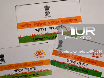 A photo taken in Tehatta, West Bengal, India on 01 July 2021 show the Aadhaar Cards issued by the Unique Identification Authority of India (...