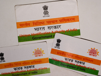 A photo taken in Tehatta, West Bengal, India on 01 July 2021 show the Aadhaar Cards issued by the Unique Identification Authority of India (...