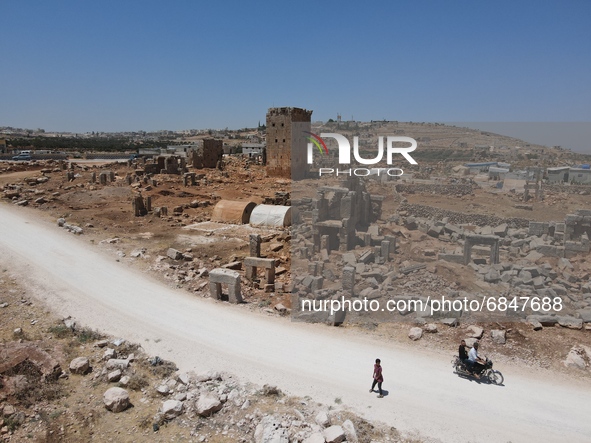 Displaced syrians live in tents in archaeological sites dating back to the Byzantine era, northwest of Syria, in the Idlib countryside, near...