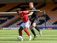 
Jayden Richardson of Nottingham Forest shields the ball from Tom Conlon of Port Vale during the Pre-season Friendly match between Port Vale...