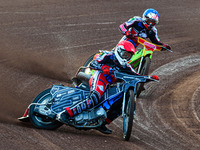   Sam McGurk   (Red) leads Ben Woodhull  (Blue) during the National Development League match between Belle Vue Colts and Eastbourne Seagulls...