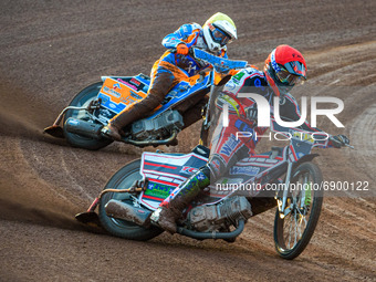   Jack Parkinson-Blackburn  (Red) leads Danno Verge  (Yellow) during the National Development League match between Belle Vue Colts and Eastb...