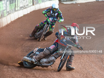   Jack Smith  (Red) leads Richard Andrews  (Blue)during the National Development League match between Belle Vue Colts and Eastbourne Seagull...