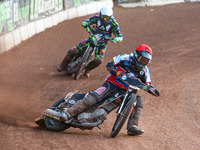   Jack Smith  (Red) leads Richard Andrews  (Blue)during the National Development League match between Belle Vue Colts and Eastbourne Seagull...