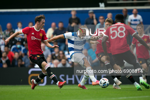   George Thomas controls the ball during the Pre-season Friendly match between Queens Park Rangers and Manchester United at the Kiyan Prince...