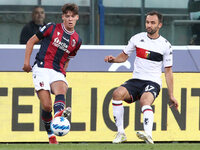 Aaron Hickey (Bologna F.C.) (left) and Milan Badelj (Genoa CFC)  during the Italian Serie A soccer match Bologna F.C. vs Genoa C.F.C. at the...