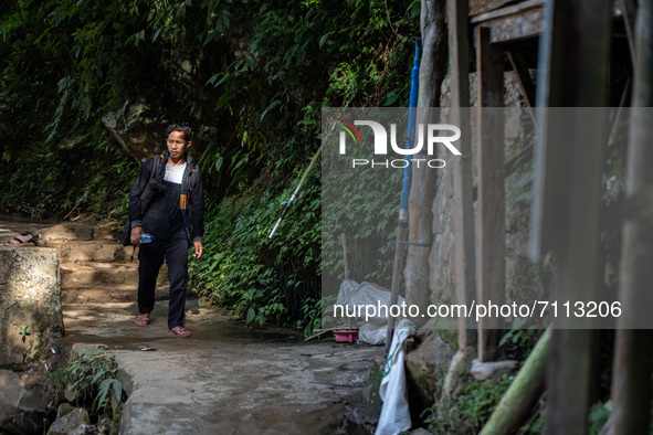  ZAELANI (22 years old) is a guide who works at the Leuwi Hejo waterfall site. Since the COVID-19 pandemic has decreased in Indonesia, touri...