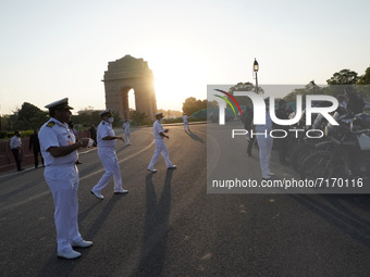 Naval officers receive the motorcycle expedition team of Indian Navy as part of ‘Swarnim Vijay Abhiyan’  at India Gate in New Delhi, India o...